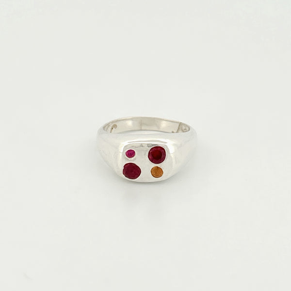 ALUMINO Ring in sterling silver, set with three round-cut stones: a yellow sapphire, ruby and hydrothermal ruby. Handmade in Melbourne by AGOVIA.