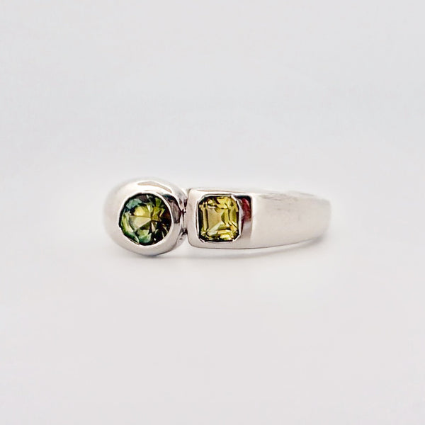 ALEC Ring in sterling silver, set with an Asscher-cut yellow sapphire and a round-cut, unheated Australian parti sapphire. Handmade in Melbourne by AGOVIA.