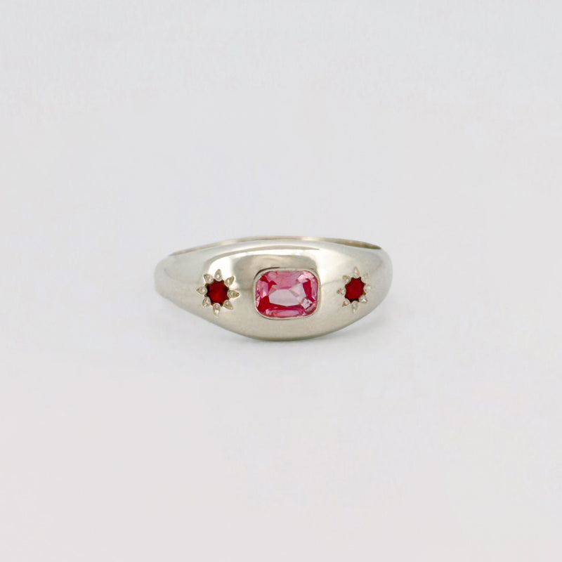 Siena Ring set with a cushion-cut pink sapphire and two star-set rubies. Handmade in Melbourne by AGOVIA.