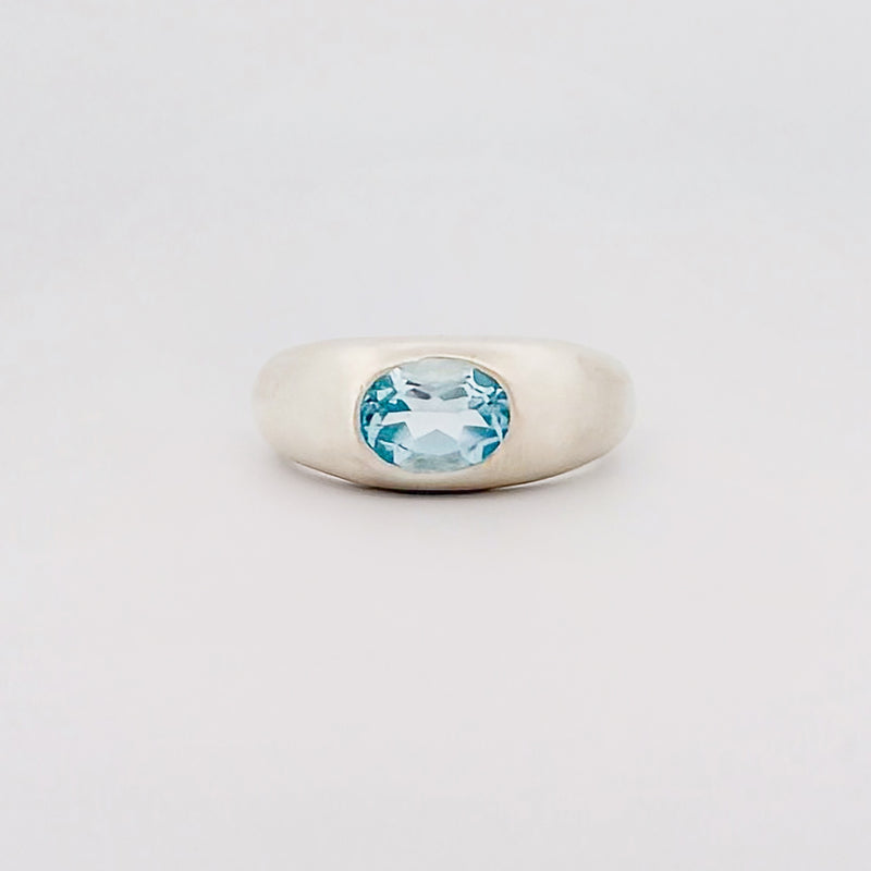 MANON Ring in sterling silver, set with a bezel-set oval Swiss blue topaz. Handmade in Melbourne by AGOVIA.