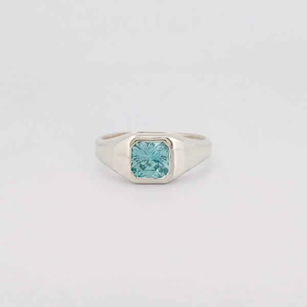 BACCHUS signet ring in sterling silver, set with a radiant-cut blue zircon. Handmade in Melbourne by AGOVIA.