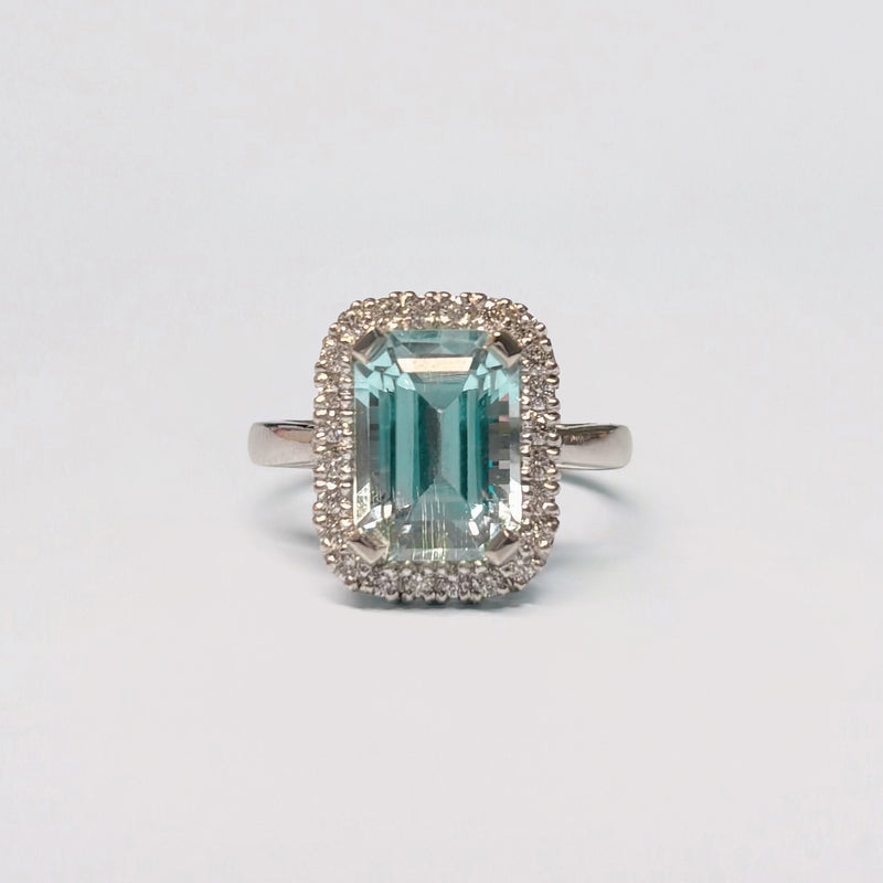 AZUL AMOR Ring set with an Afghan aquamarine and diamond halo. Available in 18ct gold or platinum. Handmade in Melbourne by AGOVIA.