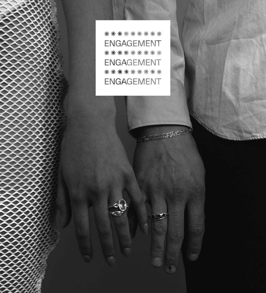 An engagement ring set with a parti sapphire