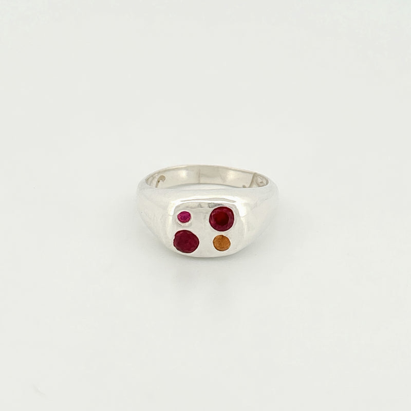 ALUMINO Ring in sterling silver, set with three round-cut stones: a yellow sapphire, ruby and hydrothermal ruby. Handmade in Melbourne by AGOVIA.