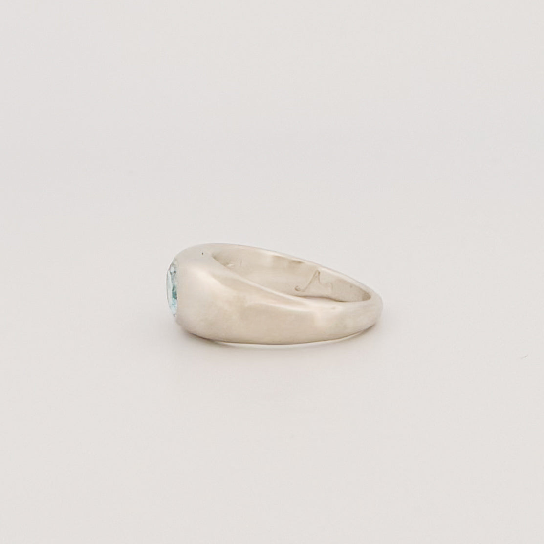 MANON Ring in sterling silver, set with a bezel-set oval Swiss blue topaz. Handmade in Melbourne by AGOVIA.