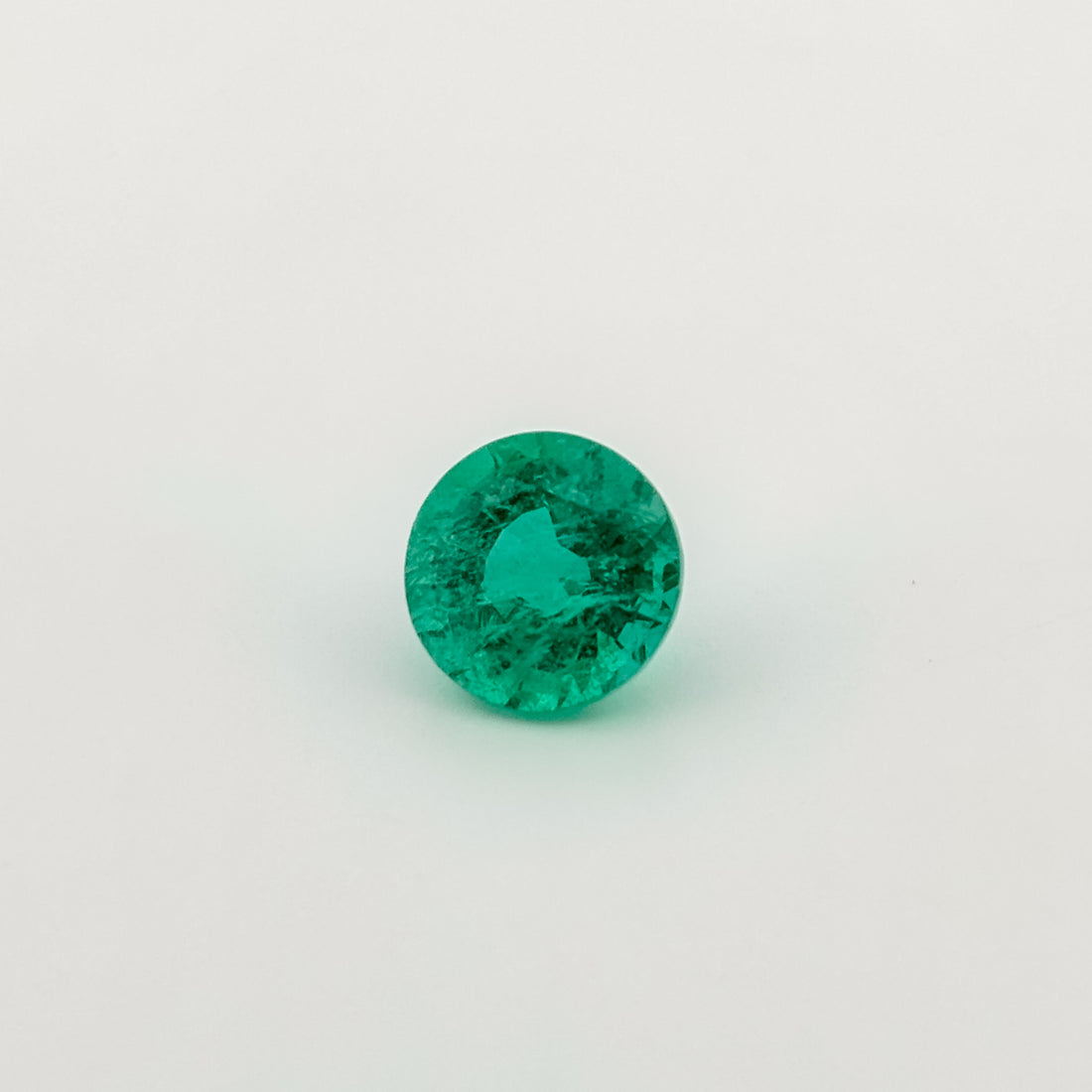 Emerald (7mm, round-cut)