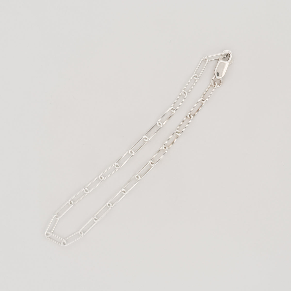 JIGGS Bracelet in sterling silver, a loose paperlink chain. Handmade in Melbourne by AGOVIA.
