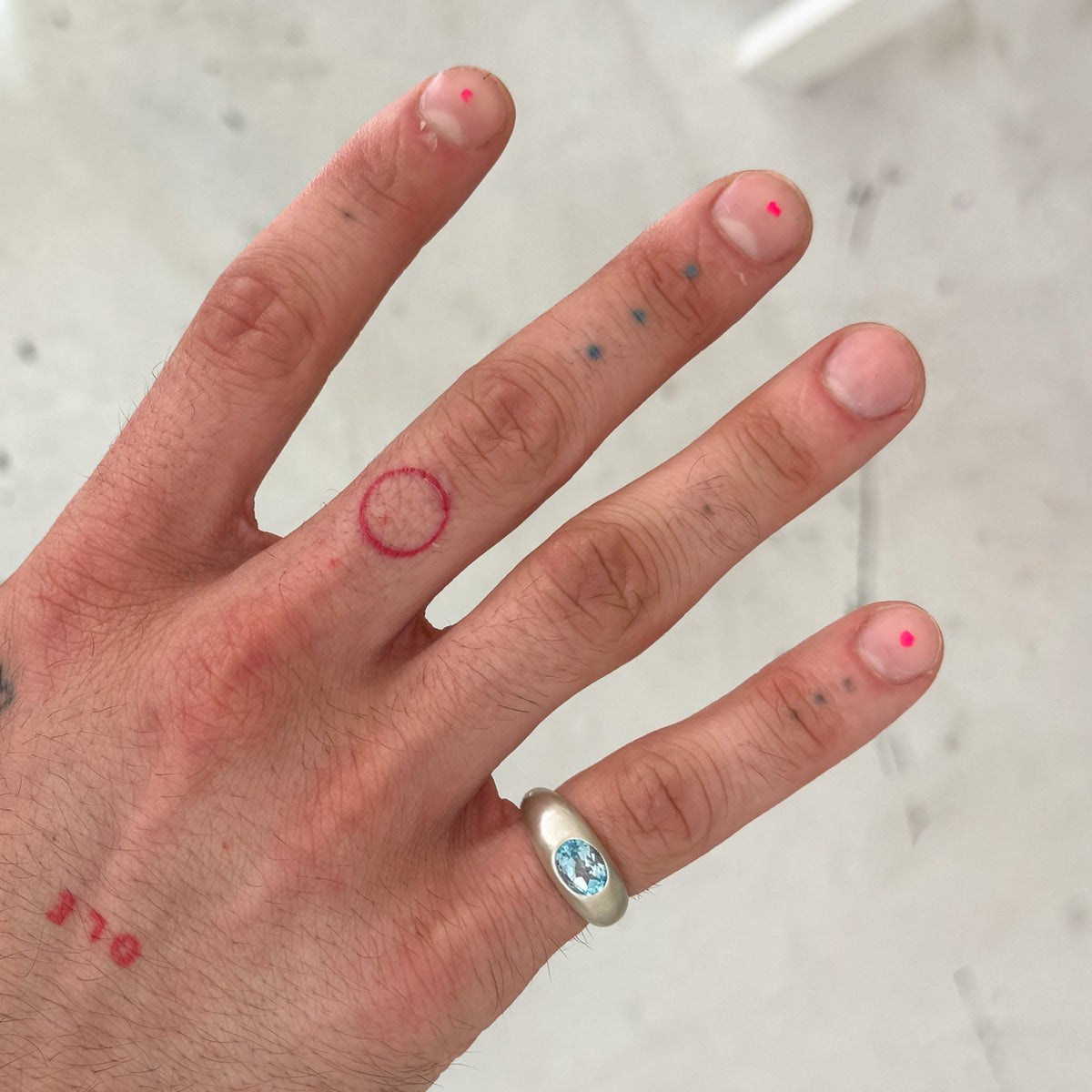 MANON Ring in sterling silver, set with a bezel-set oval Swiss blue topaz. Handmade in Melbourne by AGOVIA.