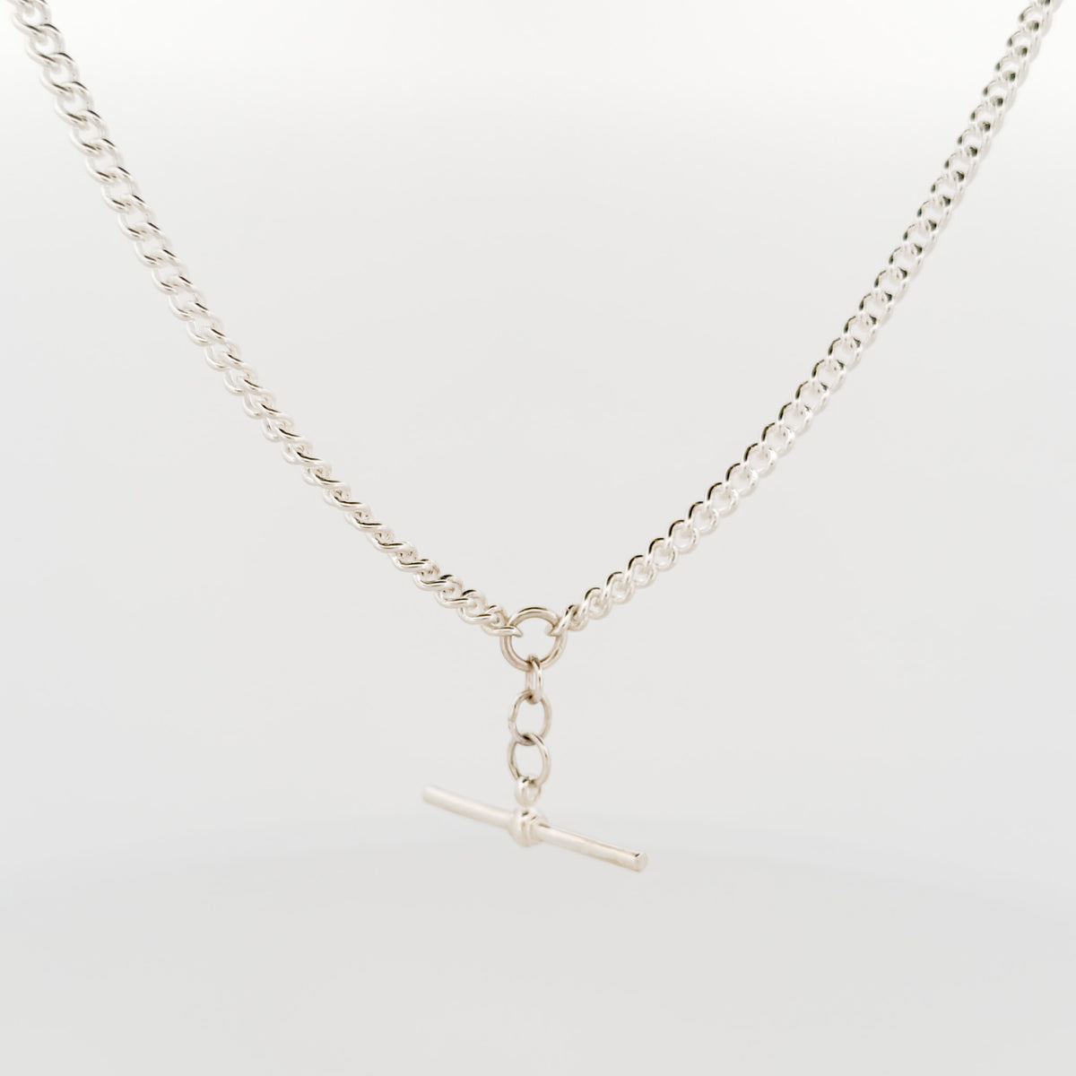 AGOVIA fob chain in sterling silver, rounded curb links with a solid T-bar. Handmade in Melbourne.