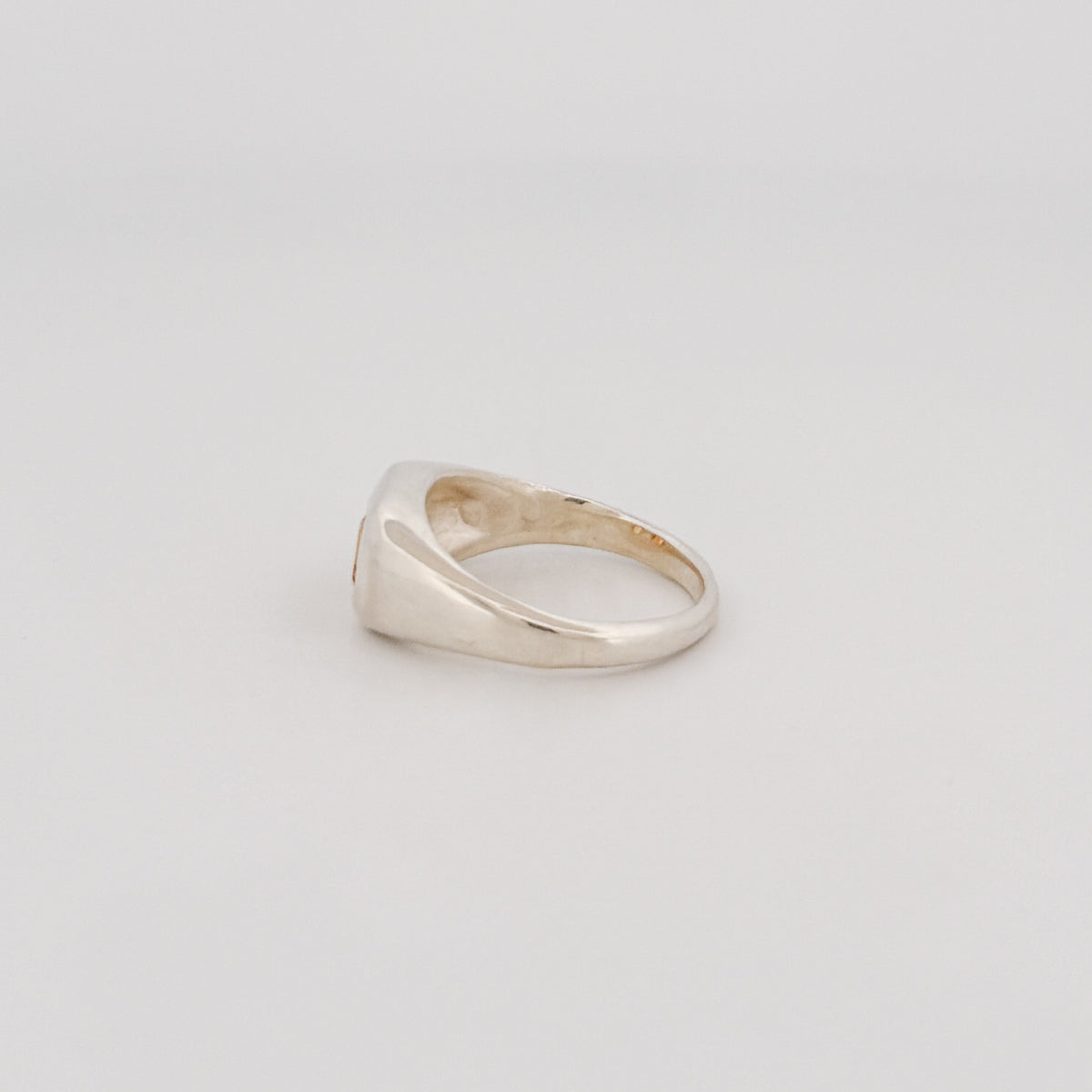 FLAVIA Ring in sterling silver, set with emerald-cut orange and yellow sapphires. Handmade in Melbourne by AGOVIA.
