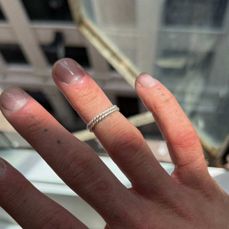 ALLORA twisted band ring in sterling silver. Handmade in Melbourne by AGOVIA.