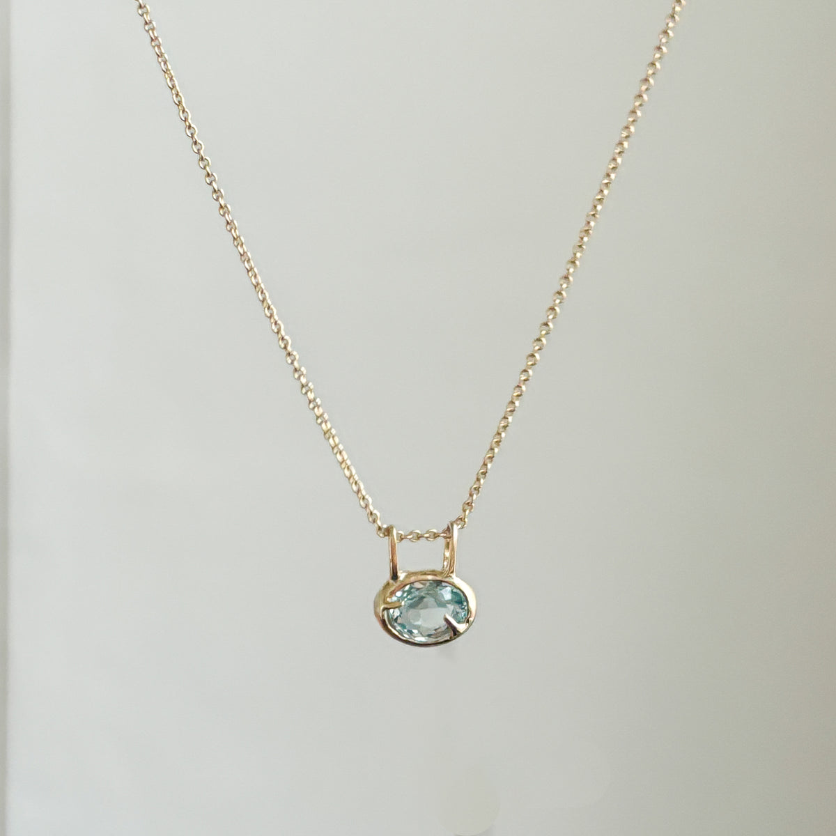 KAIRI Pendant in 9ct yellow gold, set with a 2.60ct oval aquamarine. Handmade in Melbourne by AGOVIA.