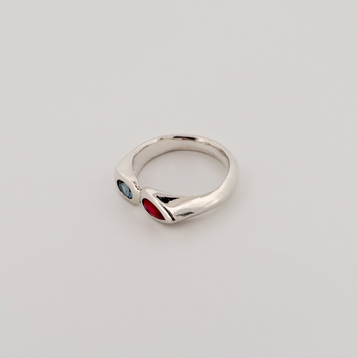 SCARLETT Ring in sterling silver, set with a pear-cut Burmese ruby and oval aquamarine. Handmade in Melbourne by AGOVIA.