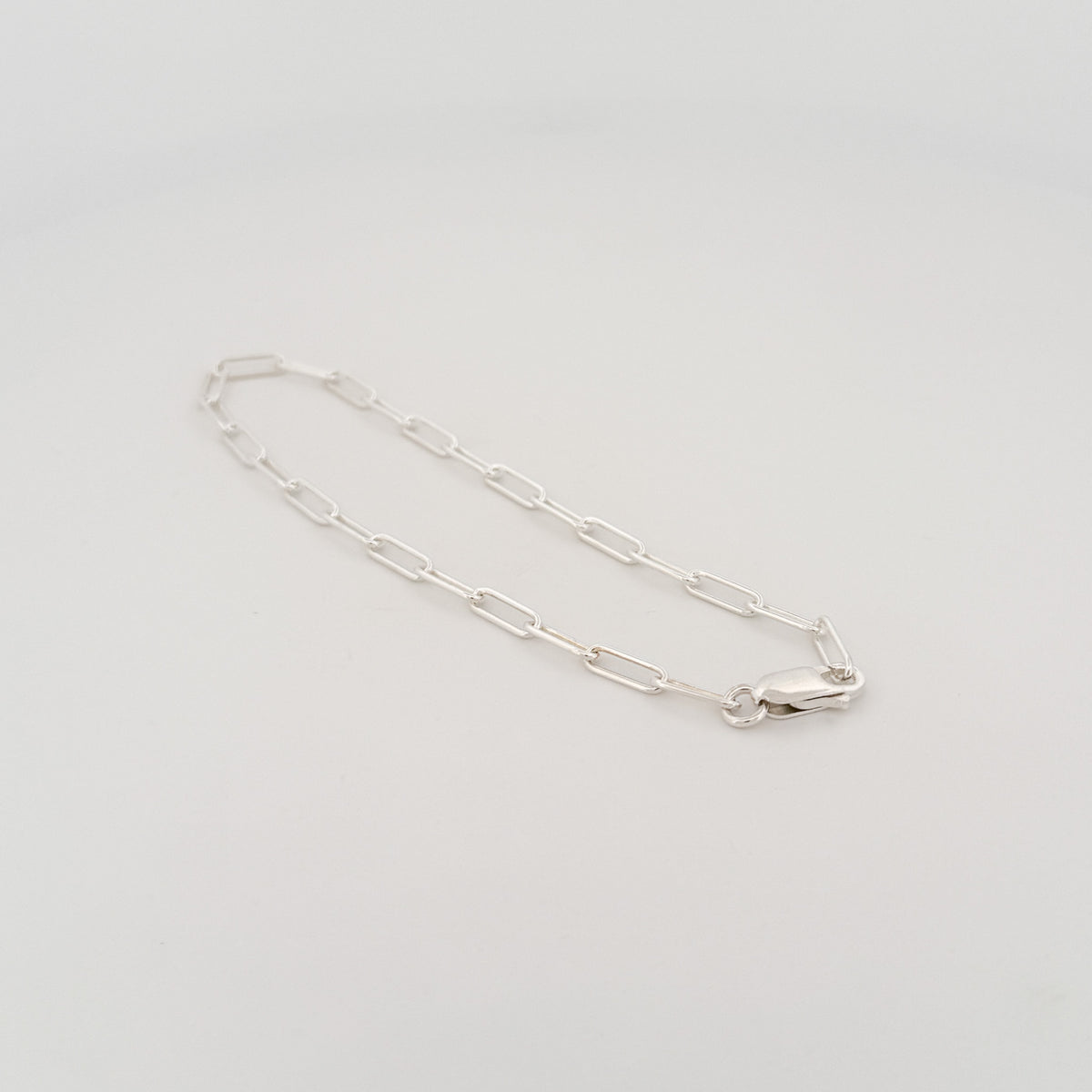 JIGGS Bracelet in sterling silver, a loose paperlink chain. Handmade in Melbourne by AGOVIA.