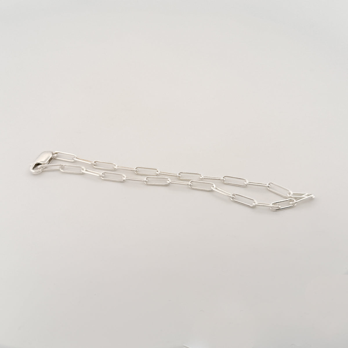 JIGGS Bracelet in sterling silver, a loose paperlink chain. Handmade in Melbourne by AGOVIA.