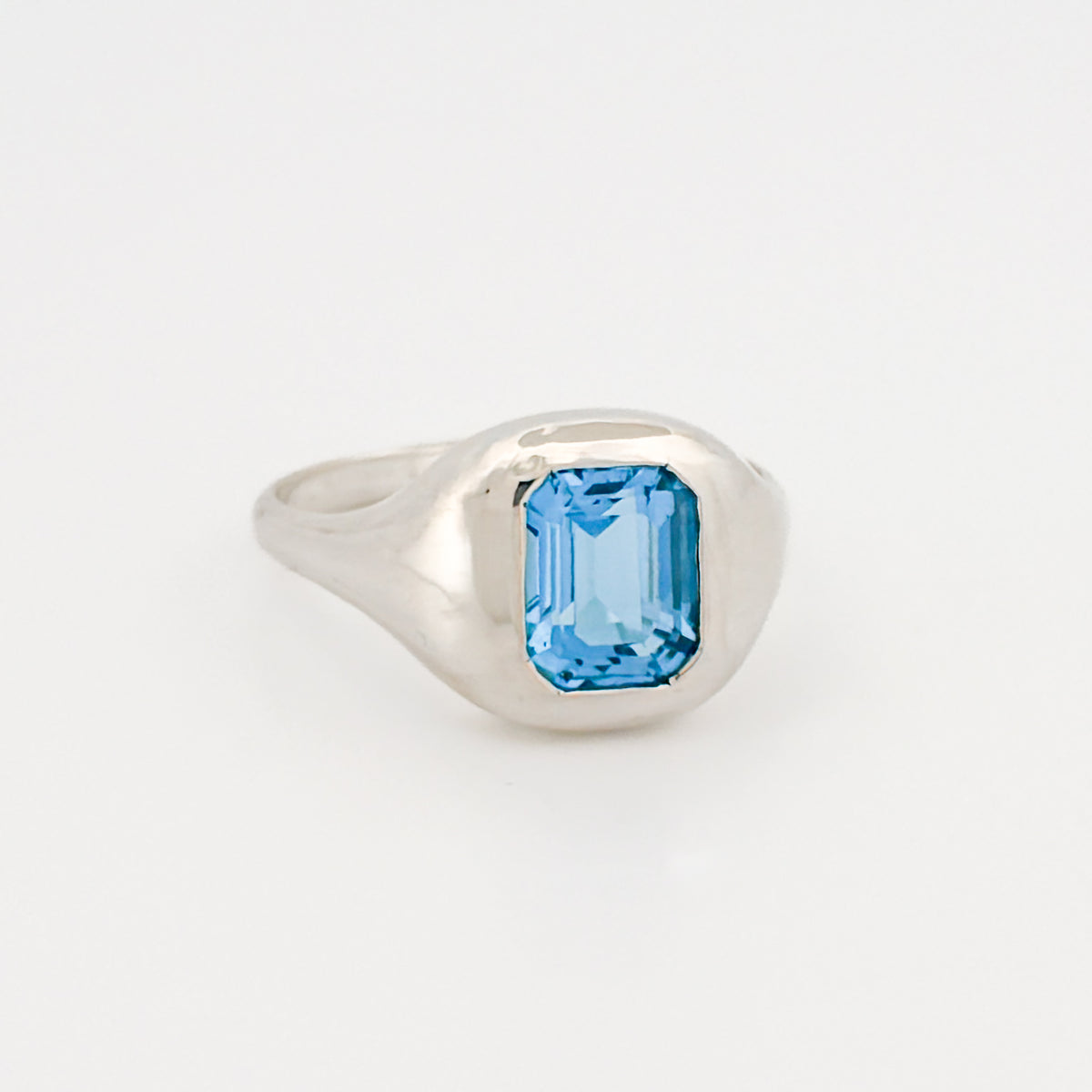 BELLO Ring in sterling silver, set with an emerald-cut Swiss blue topaz. Handmade in Melbourne by AGOVIA.
