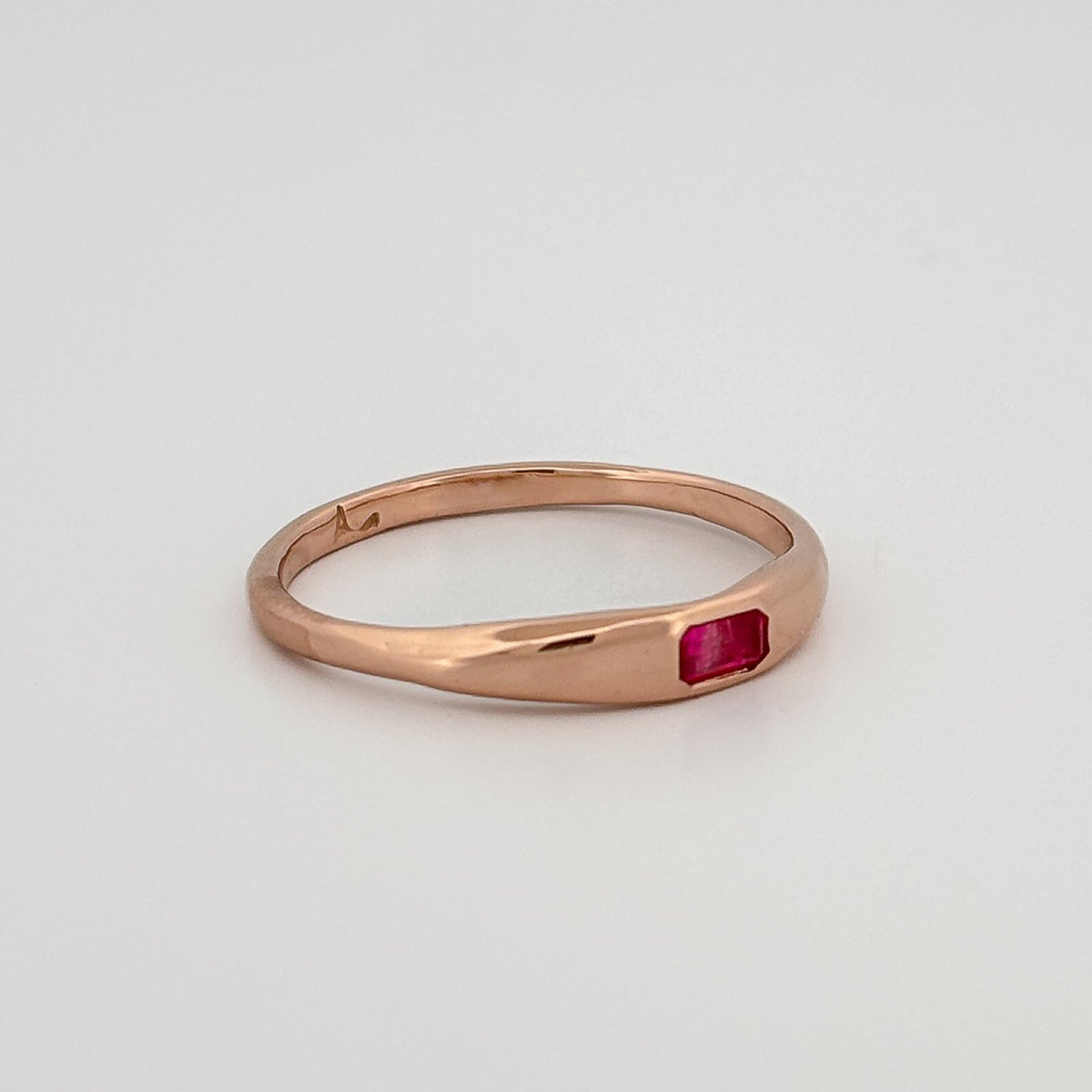 LILIAN Ring in 9ct pink gold, set with an emerald-cut ruby or blue Ceylon sapphire. Handmade in Melbourne by AGOVIA.