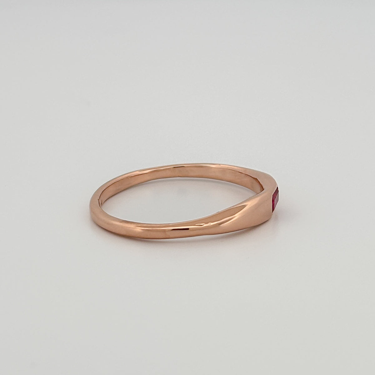 LILIAN Ring in 9ct pink gold, set with an emerald-cut ruby or blue Ceylon sapphire. Handmade in Melbourne by AGOVIA.