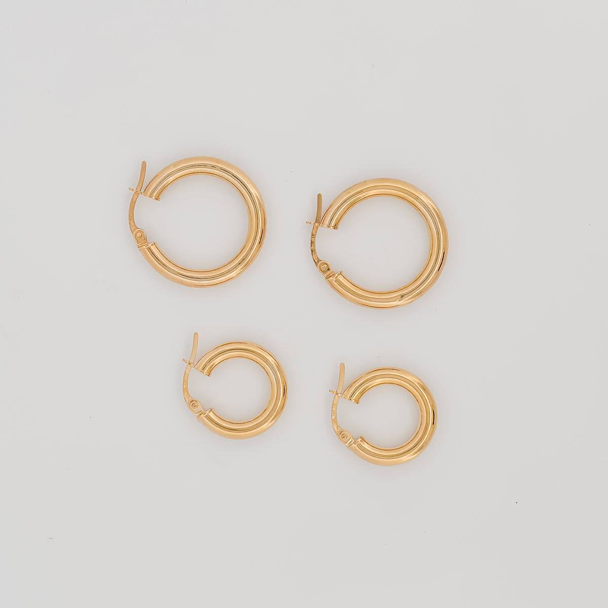 MADEIRA Hoops in solid 9ct yellow gold, classic hoop earrings. AGOVIA fine jewellery.