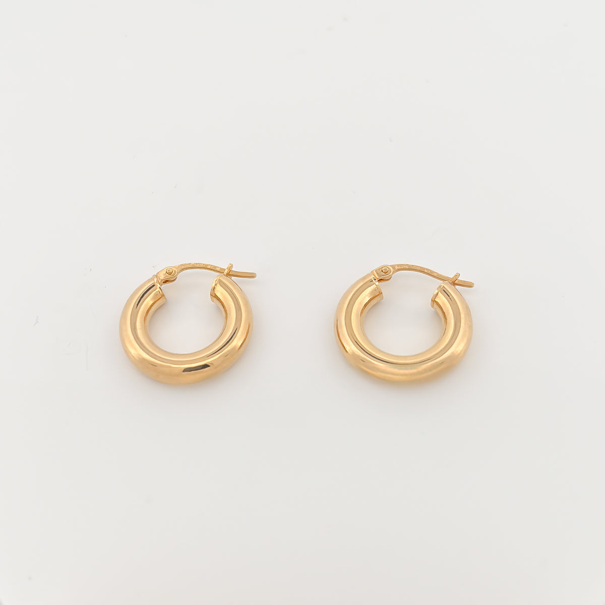 SOCA Hoops in solid 9ct or 18ct yellow gold, geometric rattan-inspired design. AGOVIA fine jewellery.