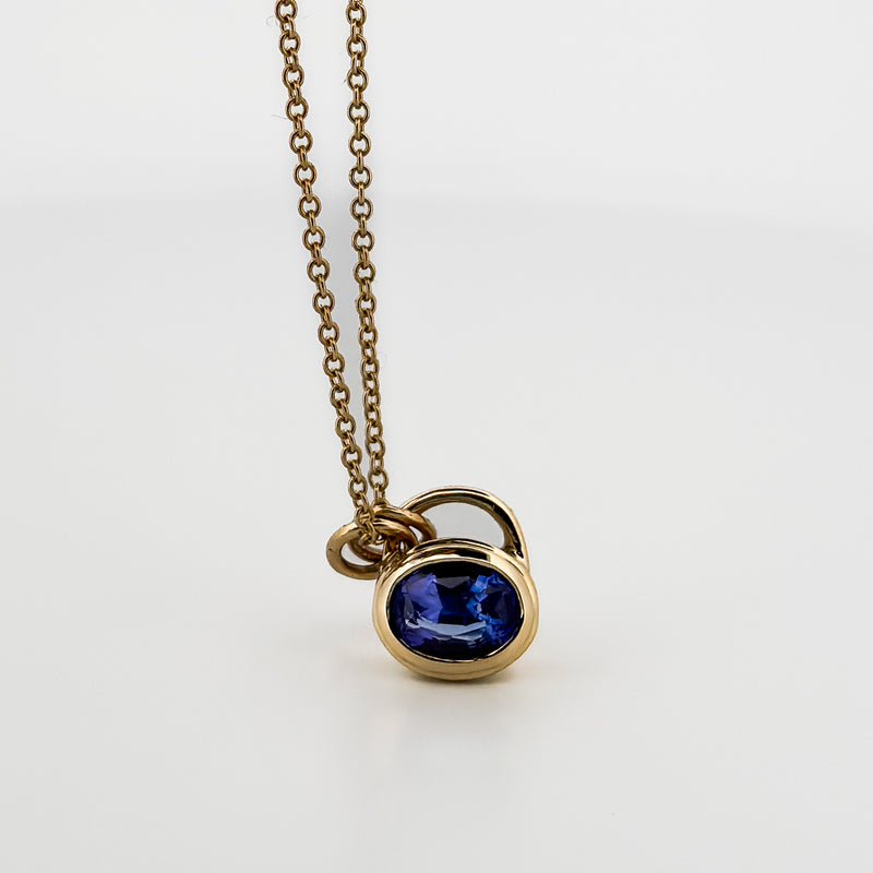OTTO Pendant in 9ct yellow gold, set with an oval tanzanite. Handmade in Melbourne by AGOVIA.