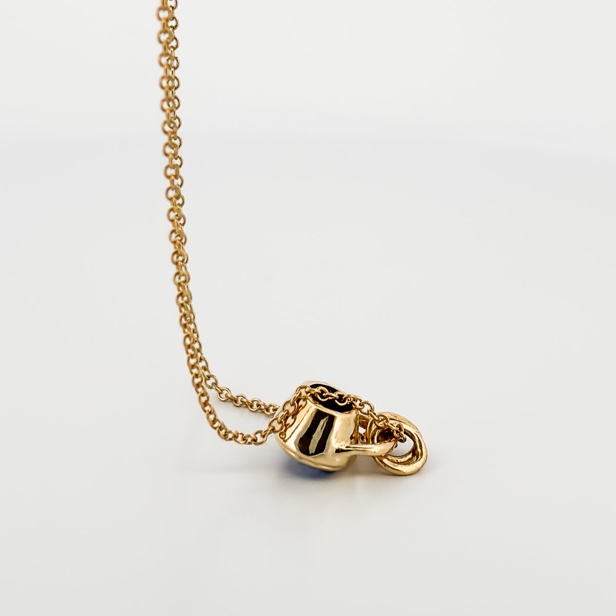 OTTO Pendant in 9ct yellow gold, set with an oval tanzanite. Handmade in Melbourne by AGOVIA.