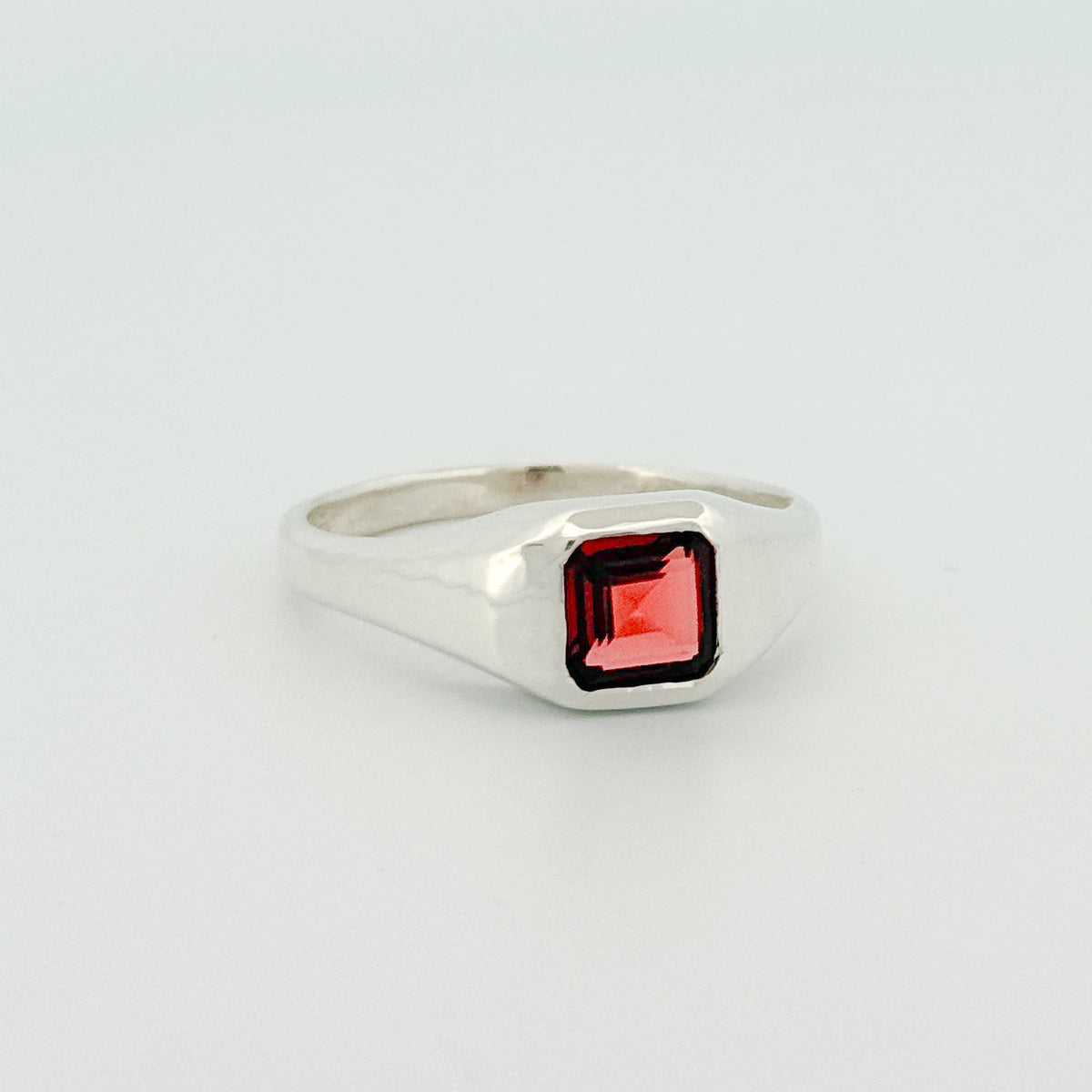 BACCHUS signet ring in sterling silver, set with a square-cut almandine garnet. Handmade in Melbourne by AGOVIA.
