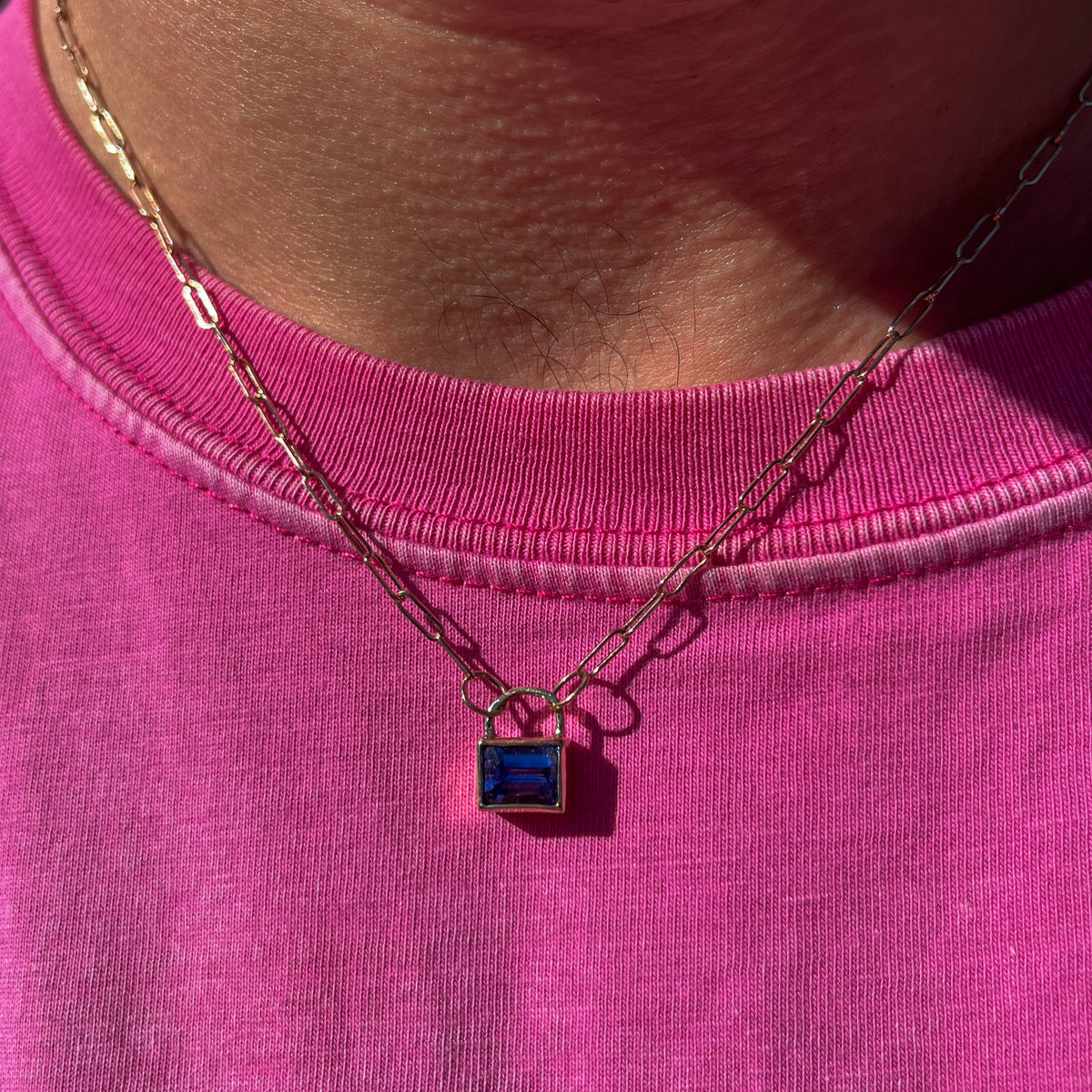 J'OUVERT Pendant in 9ct yellow gold, set with an 8x6mm emerald-cut tanzanite. Handmade in Melbourne by AGOVIA.