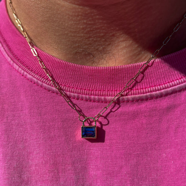 J'OUVERT Pendant in 9ct yellow gold, set with an 8x6mm emerald-cut tanzanite. Handmade in Melbourne by AGOVIA.