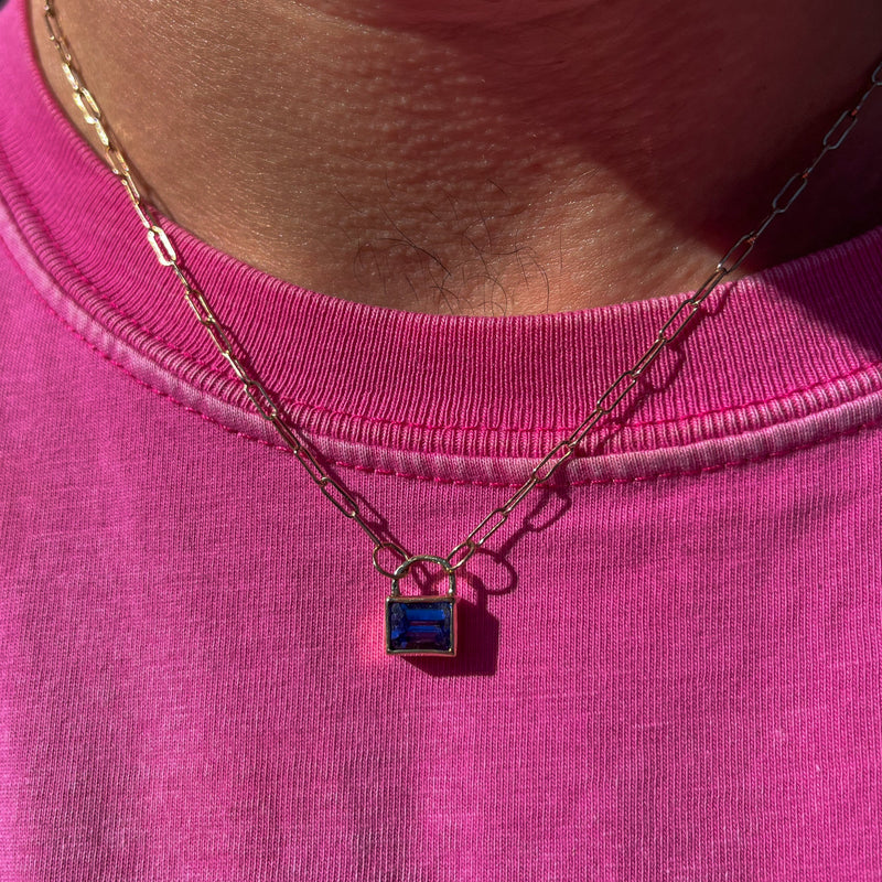 J'OUVERT Pendant in 9ct yellow gold, set with an 8x6mm emerald-cut tanzanite. Handmade in Melbourne by AGOVIA.