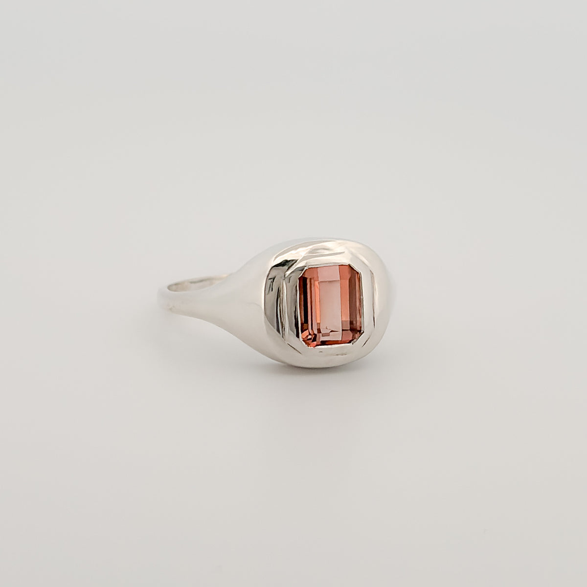 ATTIS Ring in sterling silver, set with an emerald-cut peach tourmaline. Handmade in Melbourne by AGOVIA.