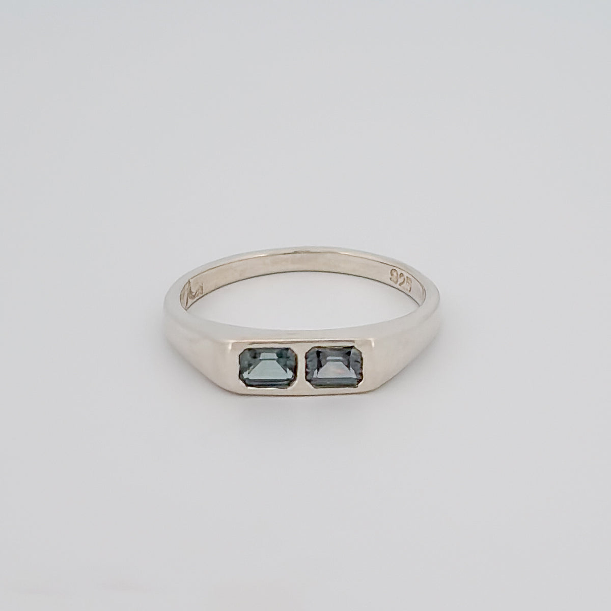 AYXA Ring in sterling silver, set with emerald-cut green sapphires. Handmade in Melbourne by AGOVIA.