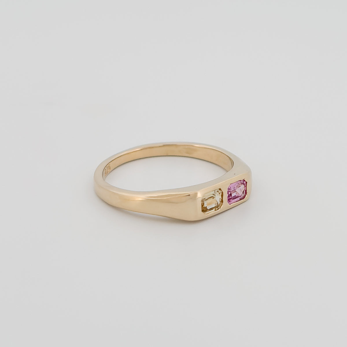 TECLA Ring in 9ct yellow gold, set with emerald-cut pink and yellow Ceylon sapphires. Handmade in Melbourne by AGOVIA.