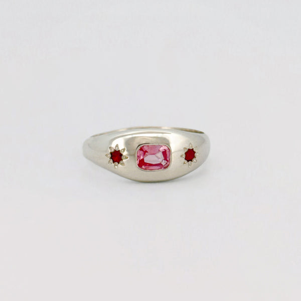 Siena Ring set with a cushion-cut pink sapphire and two star-set rubies. Handmade in Melbourne by AGOVIA.