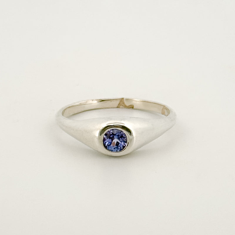 LOLA Ring in sterling silver, set with a round-cut tanzanite. Handmade in Melbourne by AGOVIA.