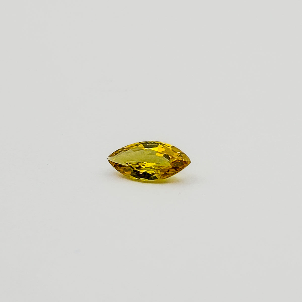 Golden Sapphire (marquise cut, 7.9x3.9mm)