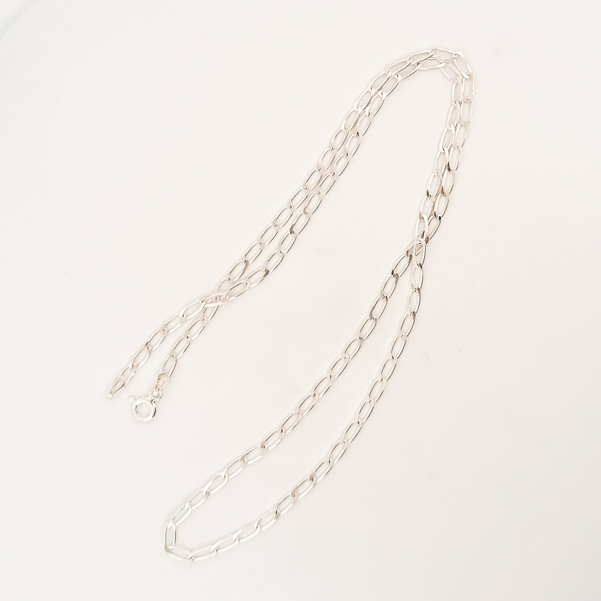 ARLO Neck Chain, a diamond-cut curb chain in sterling silver. Handmade in Melbourne by AGOVIA.