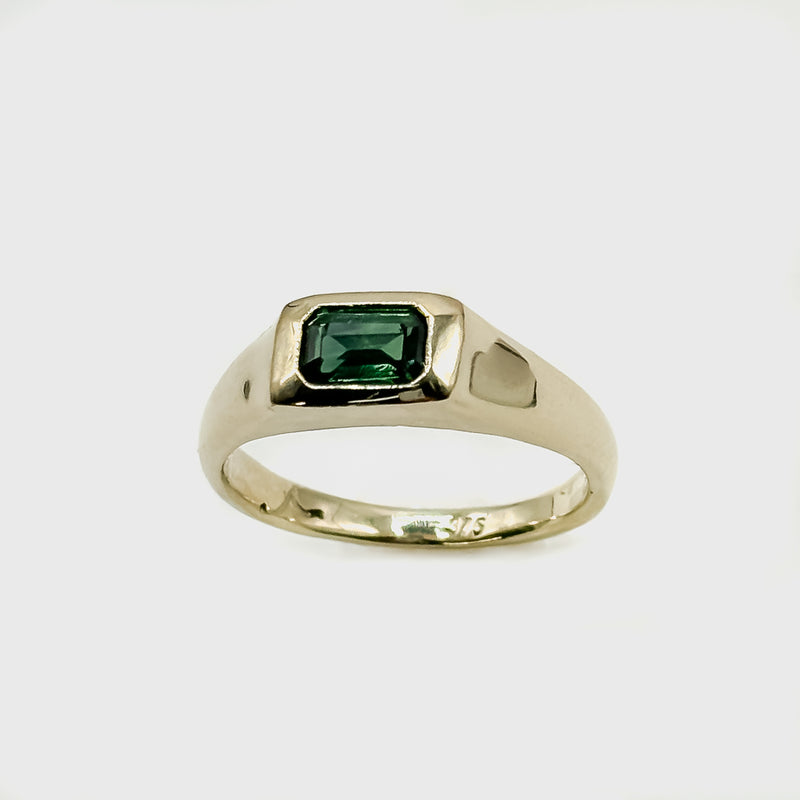 ZABOCA Ring in 9ct yellow gold, set with an Australian green sapphire, emerald cut. Handmade in Melbourne by AGOVIA.