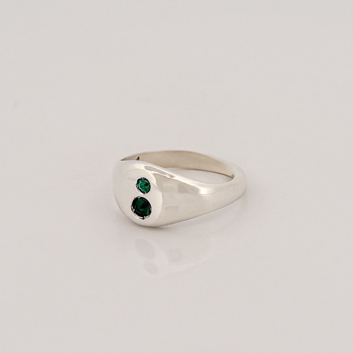 PERPETUAL signet ring in sterling silver or 9ct gold, set with two hydrothermal emeralds. Handmade in Melbourne by AGOVIA.