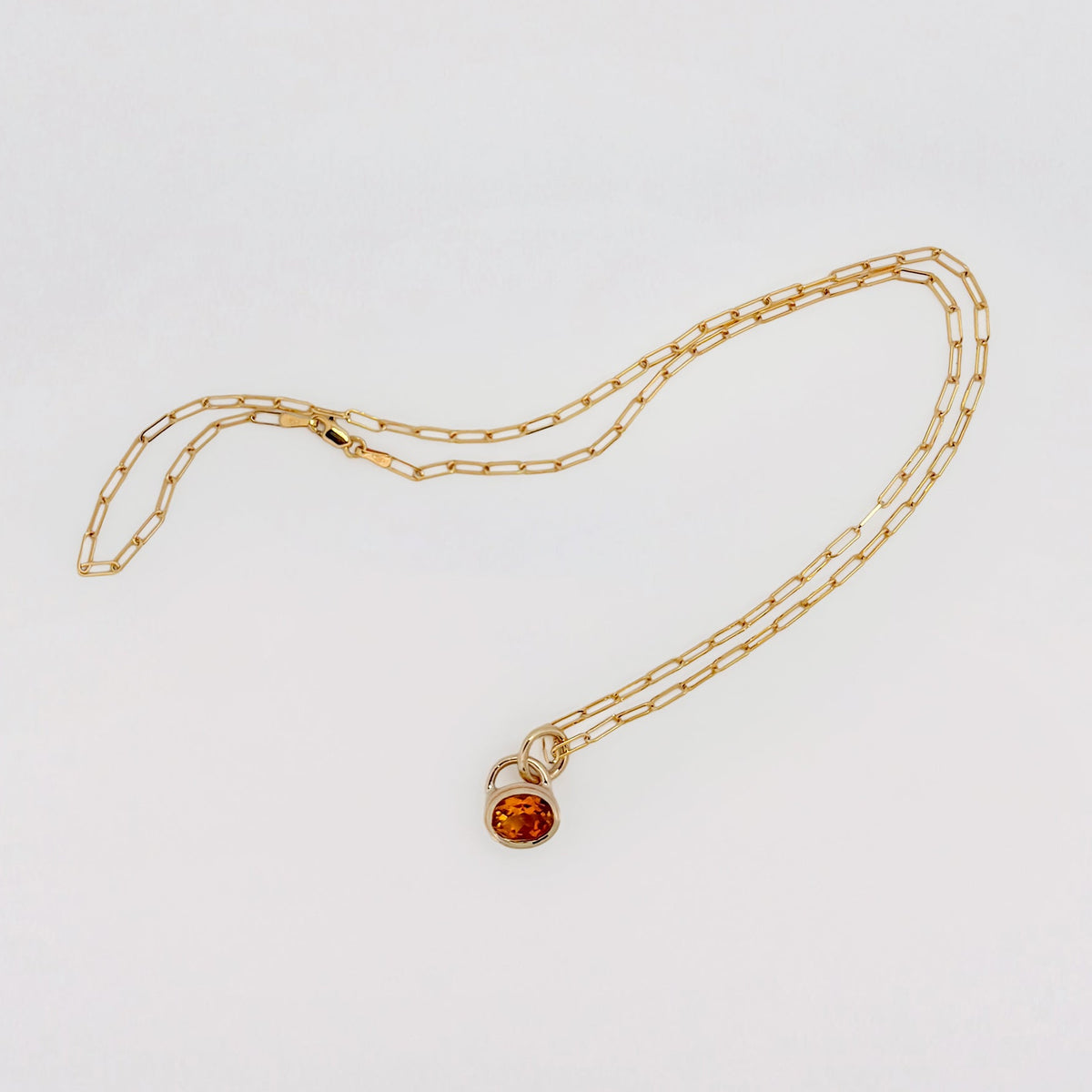 MARIGOLD Pendant in 9ct yellow gold, set with an oval-cut citrine on an Italian paperlink chain. Handmade in Melbourne by AGOVIA.