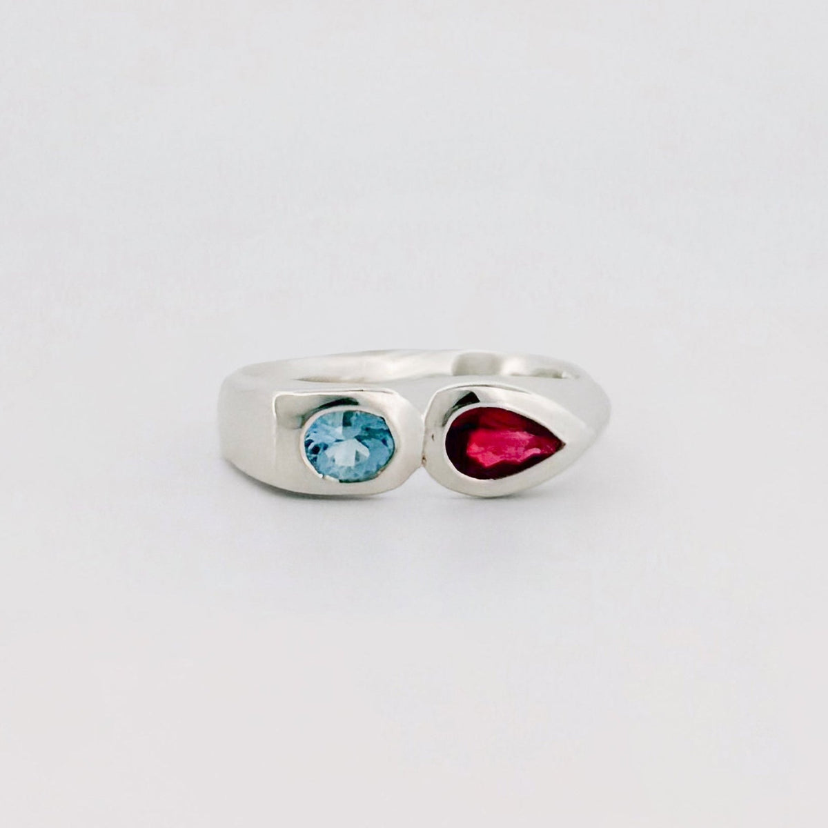 SCARLETT Ring in sterling silver, set with a pear-cut Burmese ruby and oval aquamarine. Handmade in Melbourne by AGOVIA.