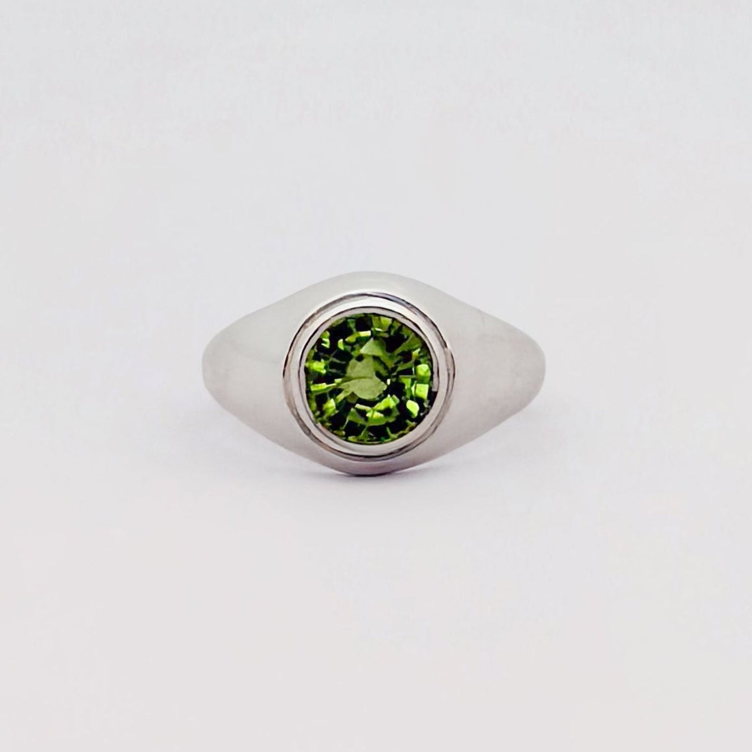 VARO Ring in recycled sterling silver, set with a round-cut peridot solitaire. Handmade in Melbourne by AGOVIA.
