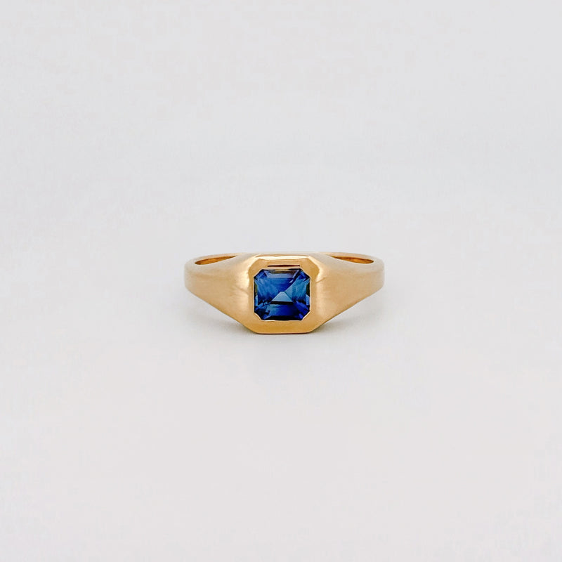 BACCHUS signet ring in 14ct yellow gold, set with an Asscher-cut Ceylon sapphire. Handmade in Melbourne by AGOVIA.