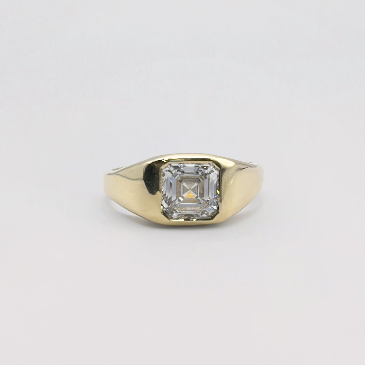 ADONIS Ring in 9ct yellow gold, set with a 2ct lab-grown diamond, angled view. Handmade in Melbourne by AGOVIA.