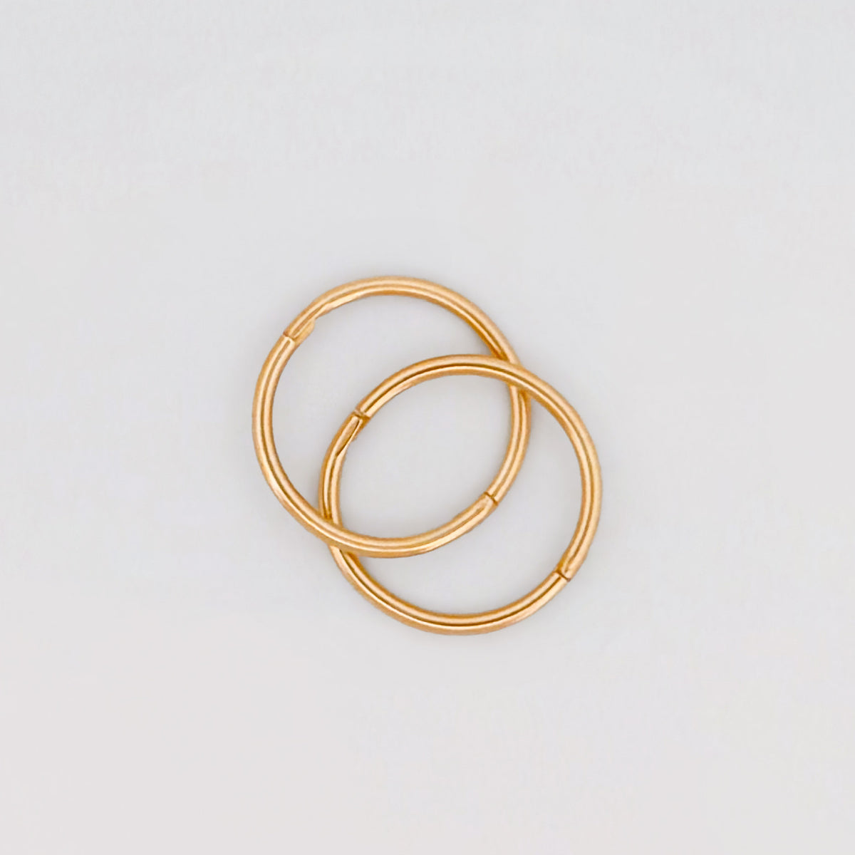 OLE sleeper hoops in solid 9ct yellow gold, hinged everyday earrings. Handmade by AGOVIA.