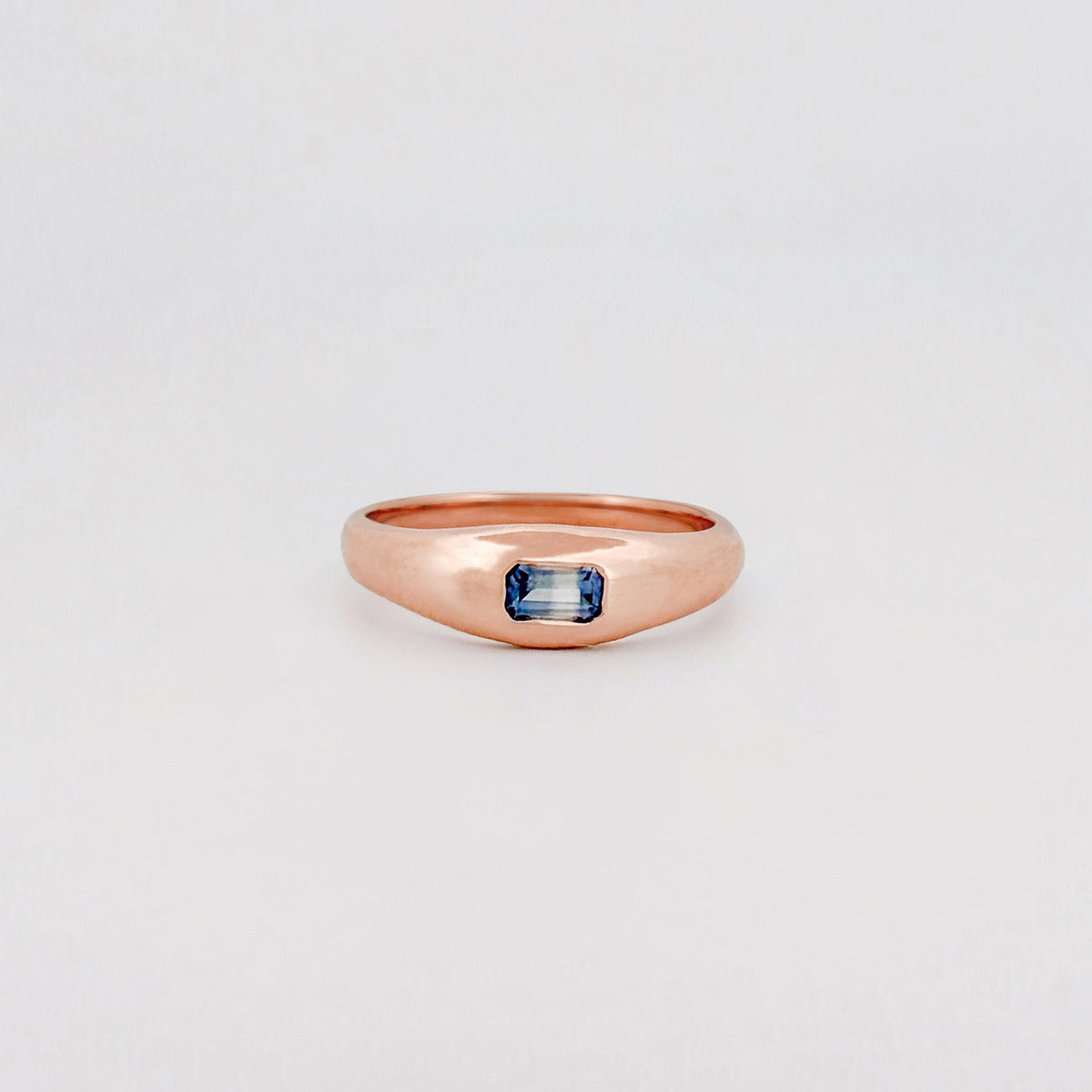 LILIAN Ring in 9ct pink gold, set with an emerald-cut ruby or blue Ceylon sapphire. Handmade in Melbourne by AGOVIA.