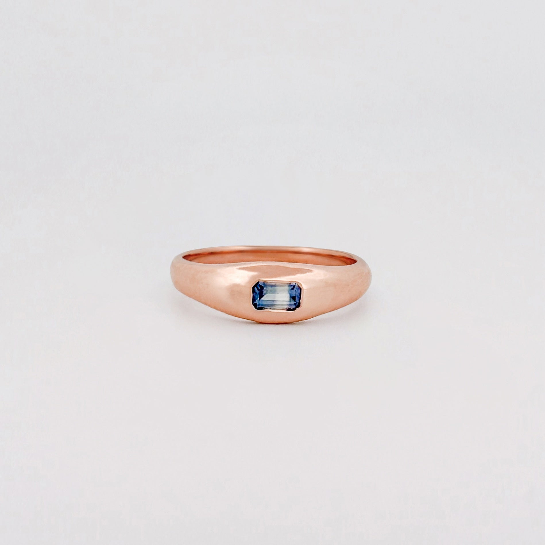 LILIAN Ring in recycled 9ct pink gold, set with an emerald-cut ruby or blue Ceylon sapphire. Handmade in Melbourne by AGOVIA.