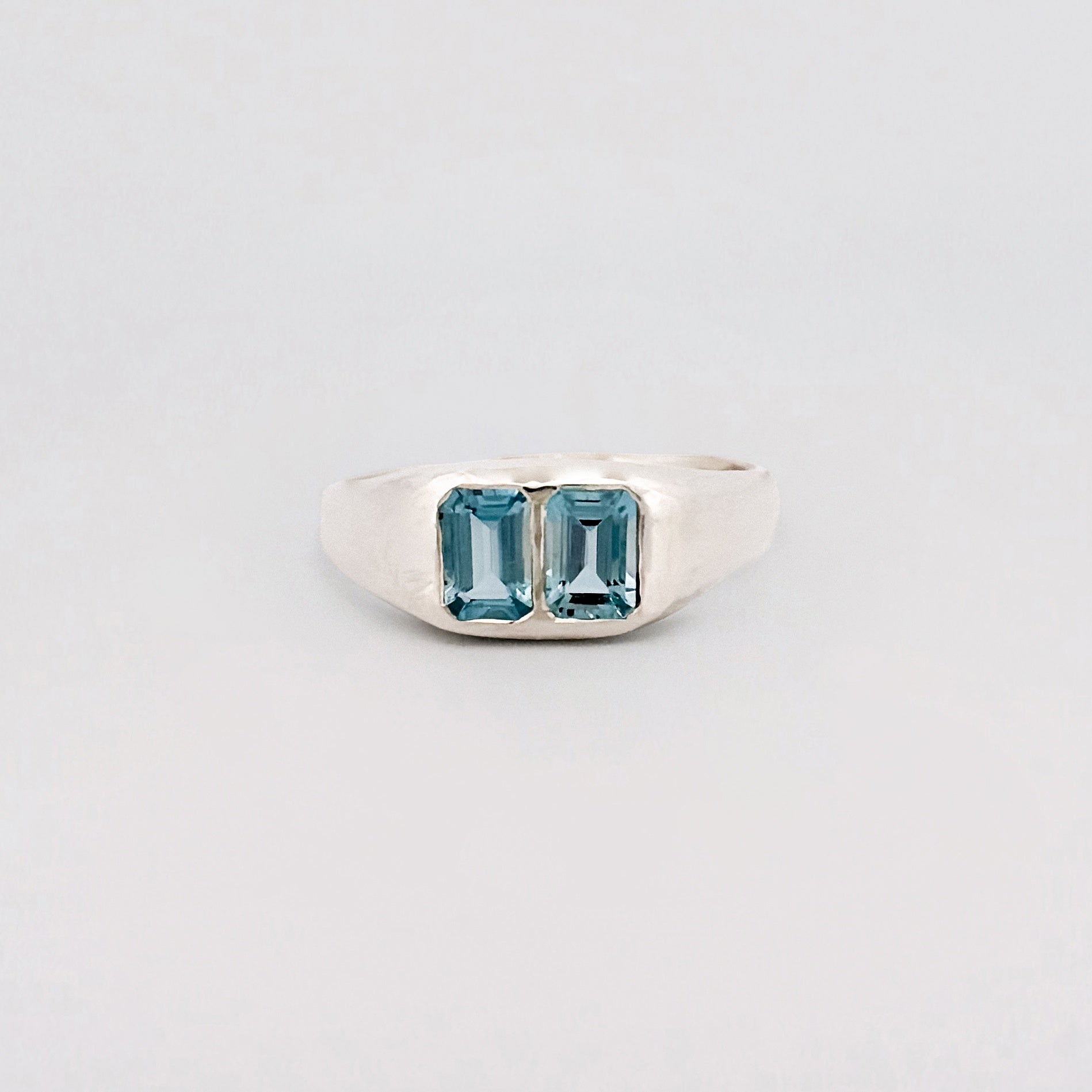 AYXA Ring in recycled sterling silver, set with an emerald-cut Australian blue sapphire. Handmade in Melbourne by AGOVIA.