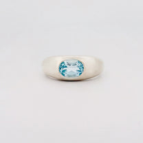 MANON Ring in recycled sterling silver, set with a bezel-set oval Swiss blue topaz. Handmade in Melbourne by AGOVIA.