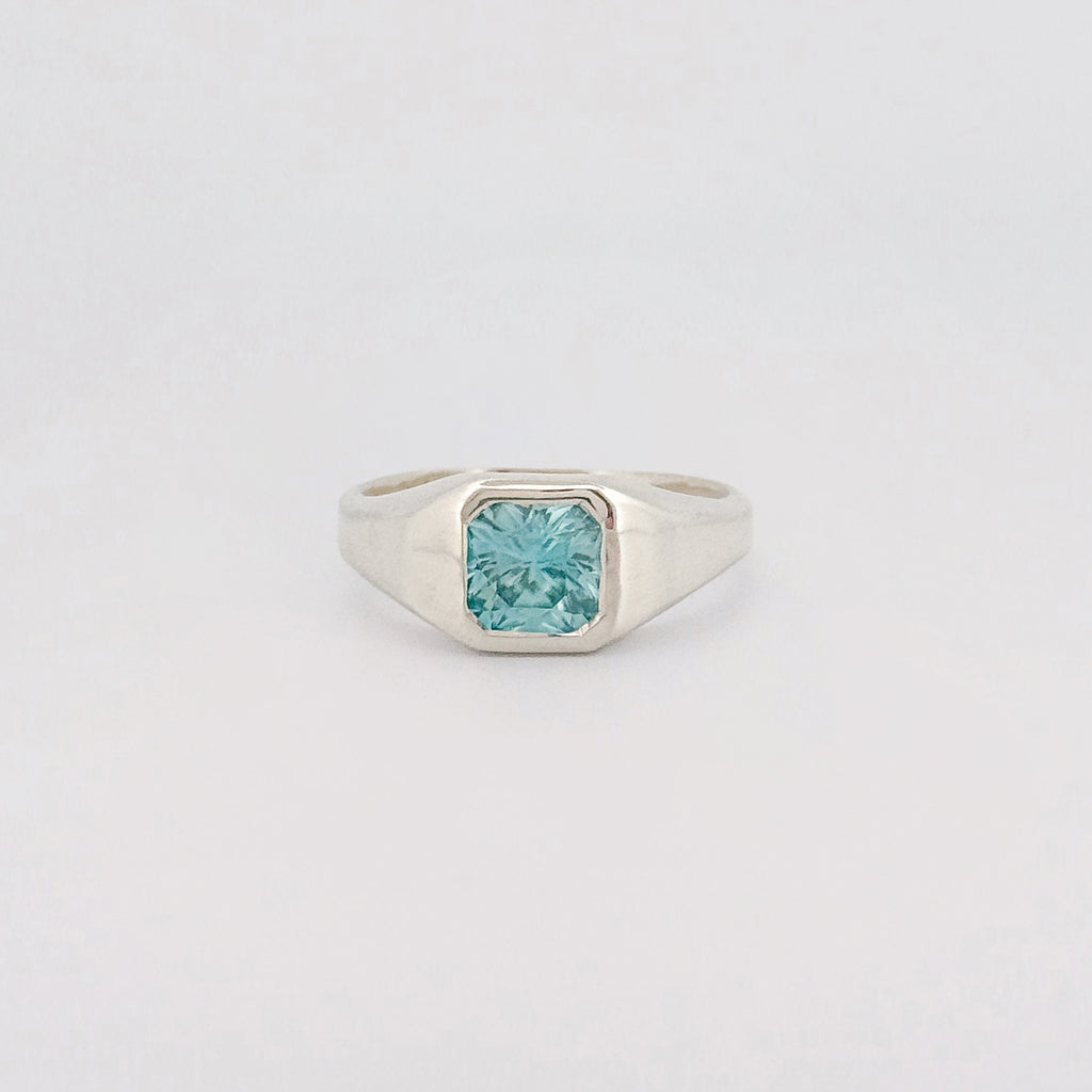 BACCHUS signet ring in recycled sterling silver, set with a radiant-cut blue zircon. Handmade in Melbourne by AGOVIA.